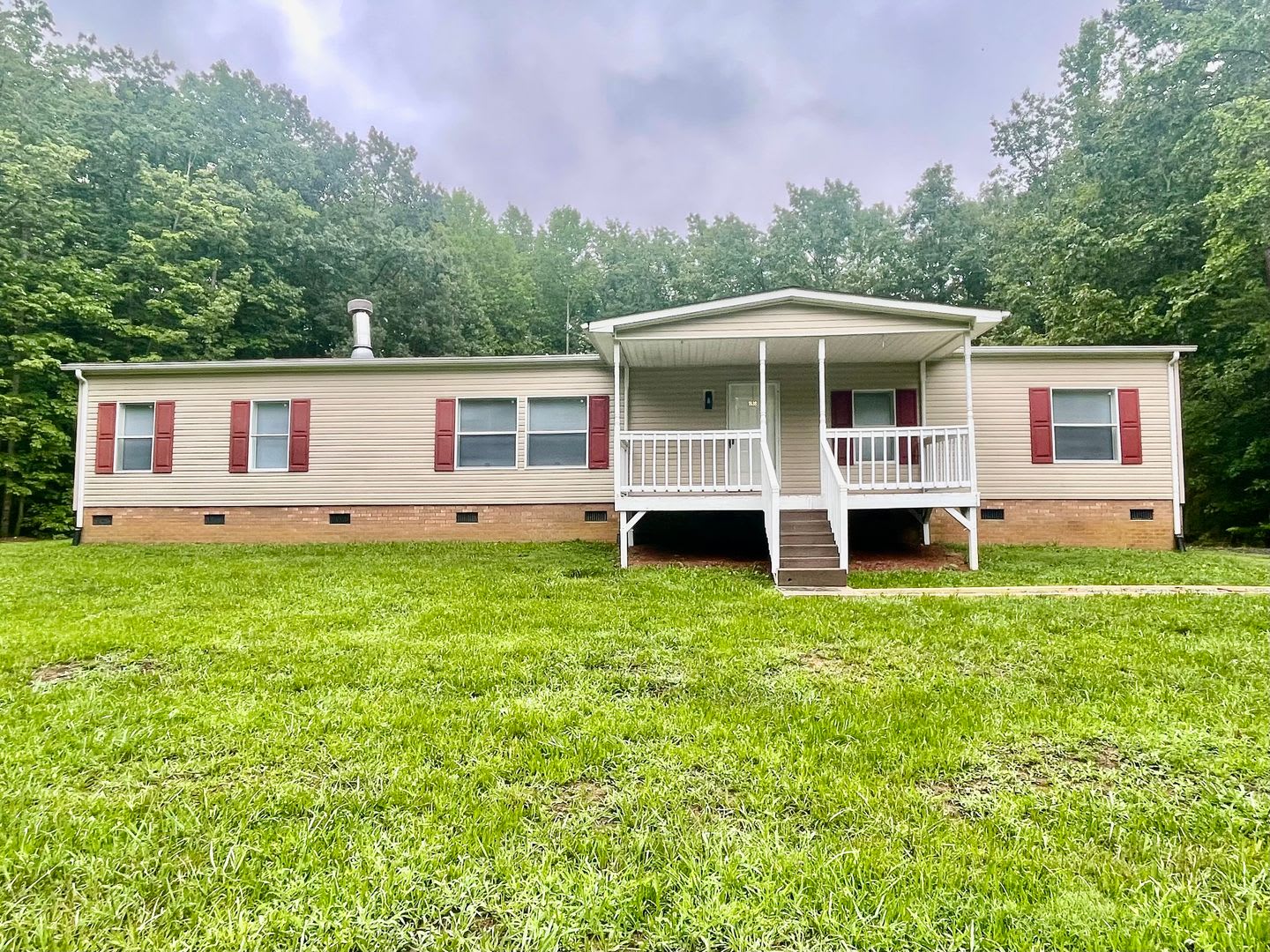 Discover this 4-bedroom, 2-bath home in Claremont, NC – photo 2